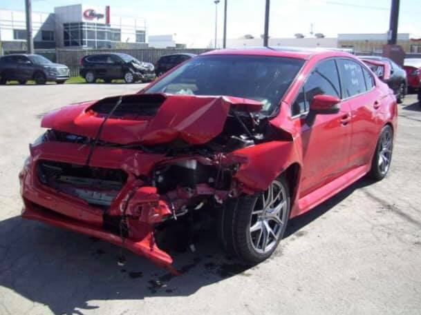 smashed red car